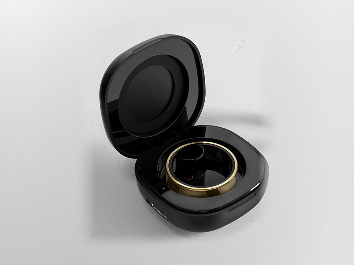 Moonphase Smart Ring in its charging case